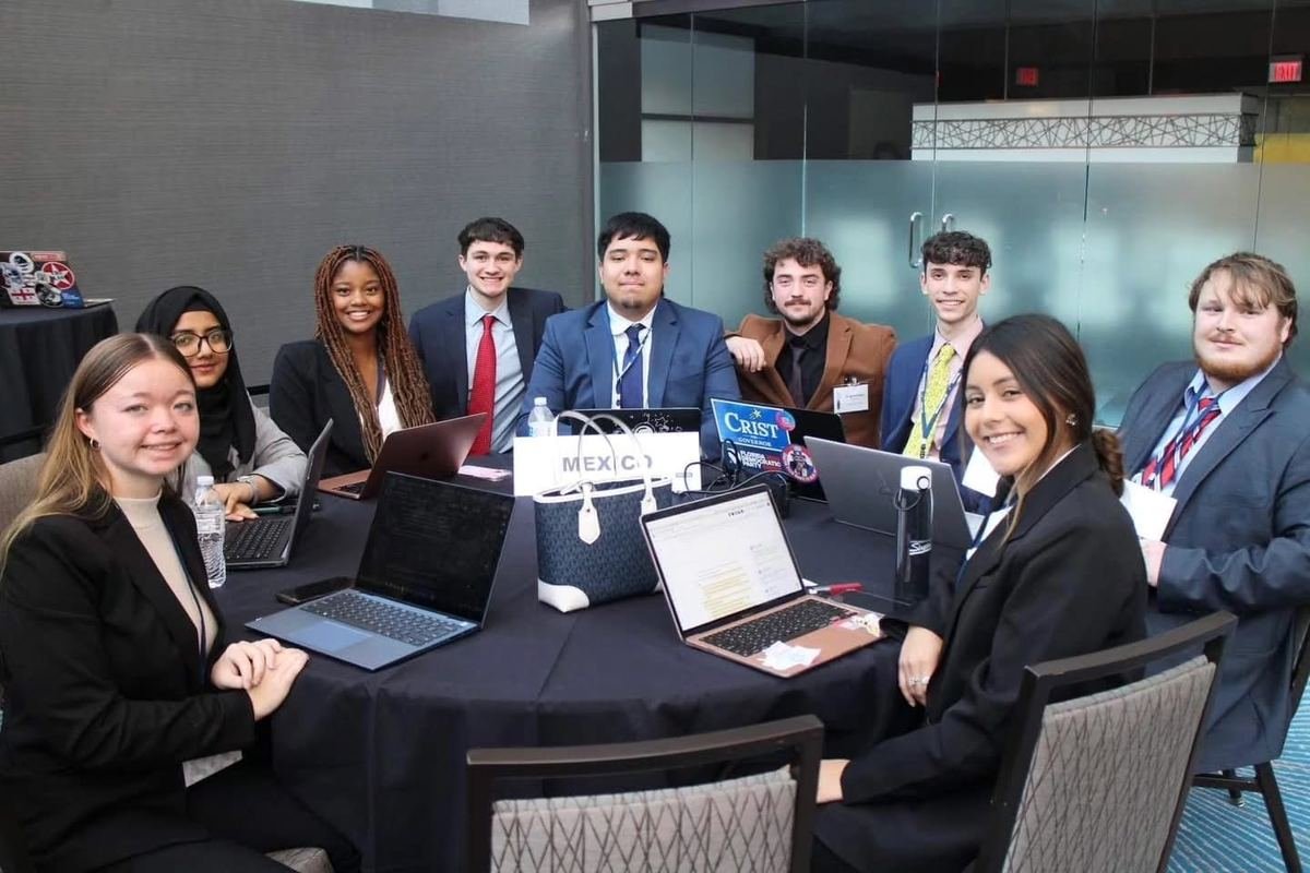 International delegates at MUN conference table