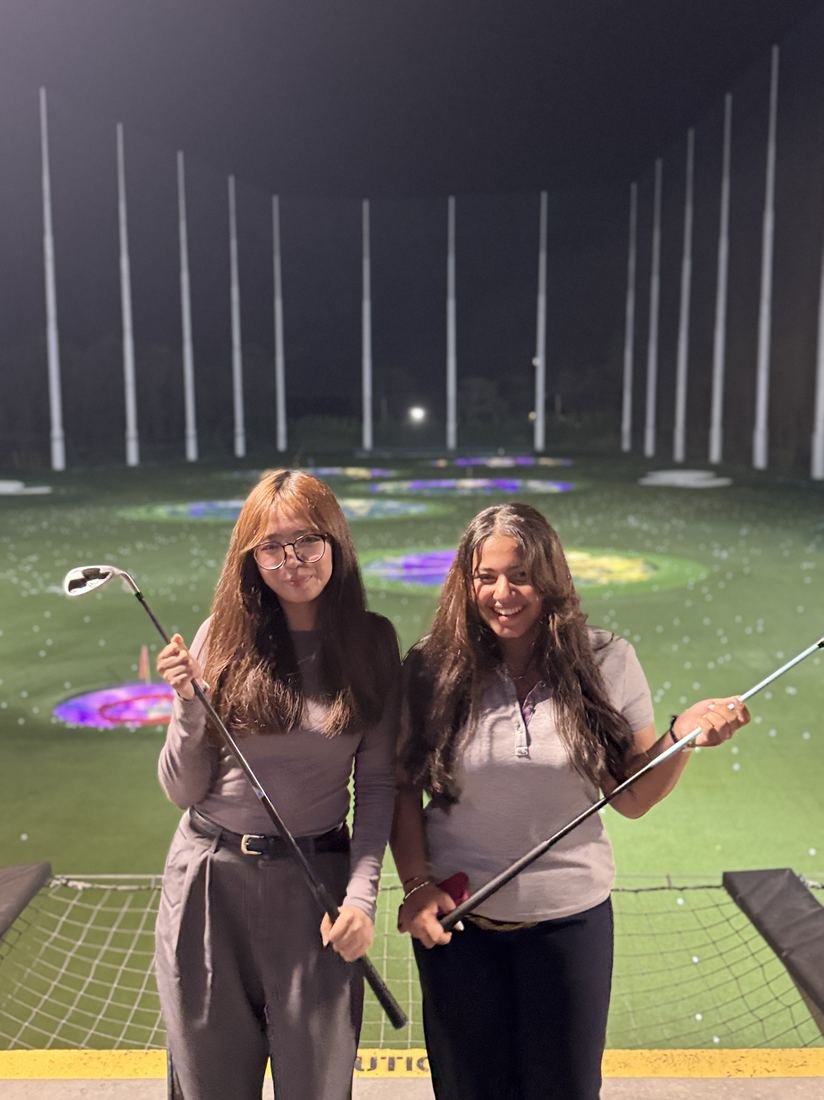 Delegates enjoying TopGolf during the trip